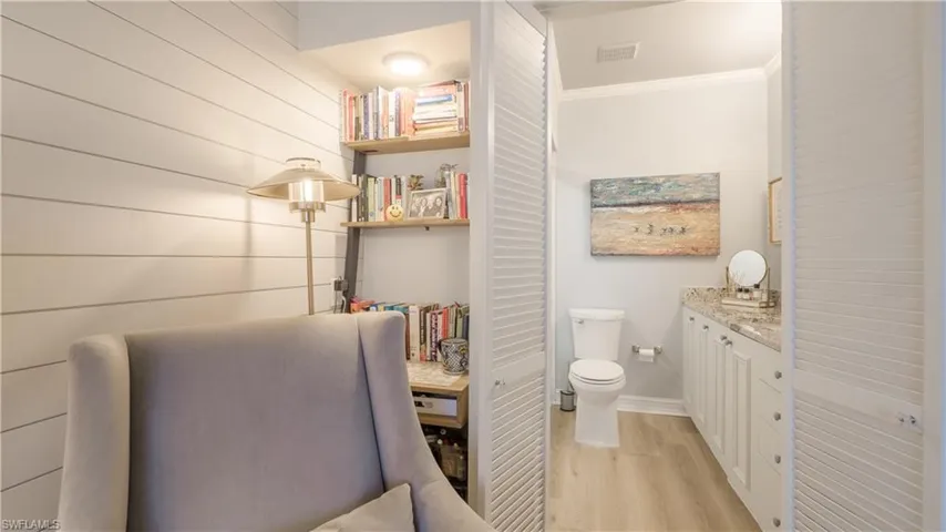 This is a closer view of the custom bookshelf/desk area in the Master Bedroom. Additional switched downlighting is a fantastic upgrade!