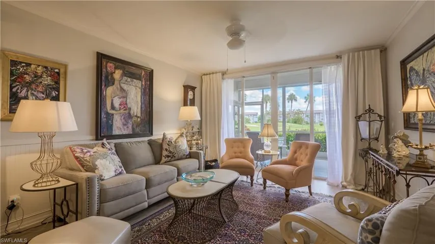 The living room is large enough for a few different conversation areas. (Some furnishings are different than pictured.)