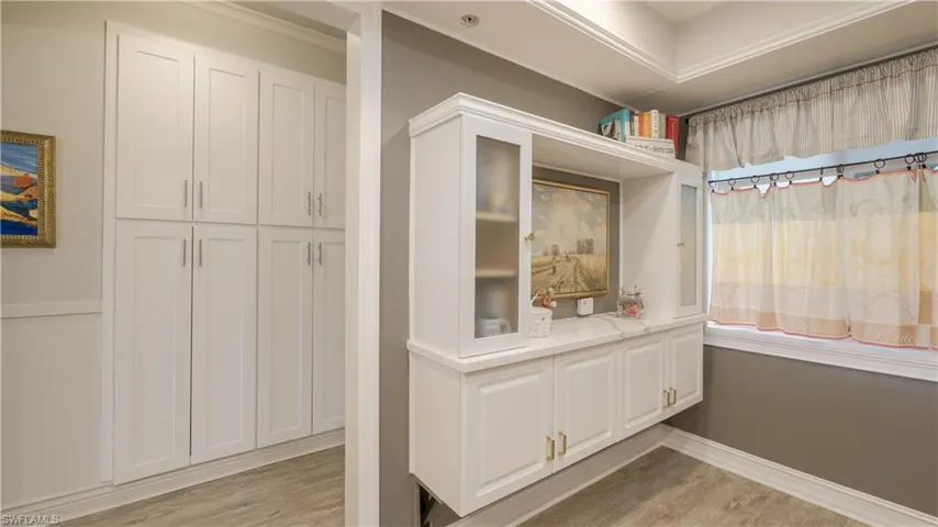 Sawgrass # 105 has built-ins GALORE! Pantry cabinets, a built-in buffet w/glass front doors and designer hardware.