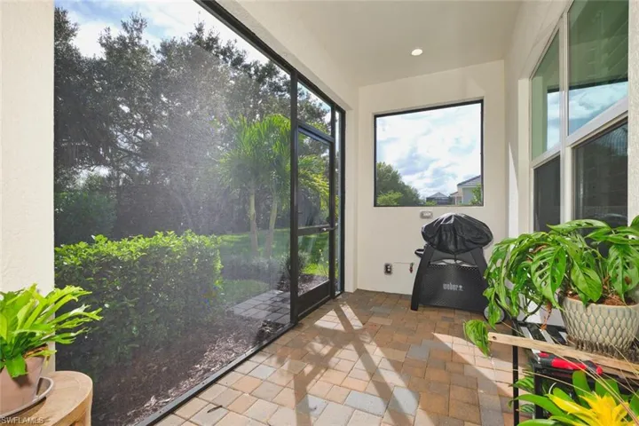 Sunroom featuring recessed lighting