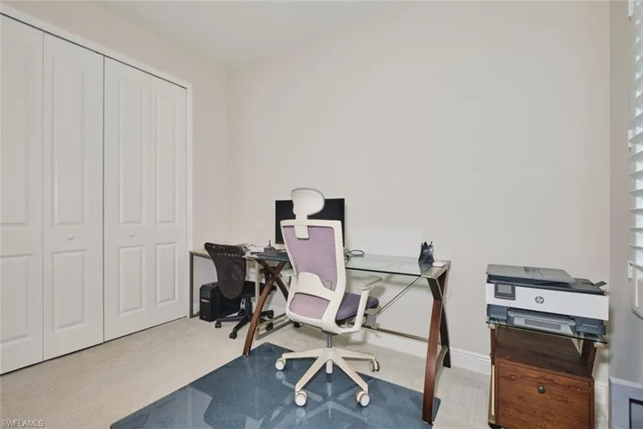 3rd Bedroom featuring light colored carpet