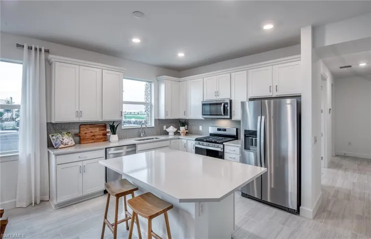 Photos are from a furnished model. Options for this home may vary.