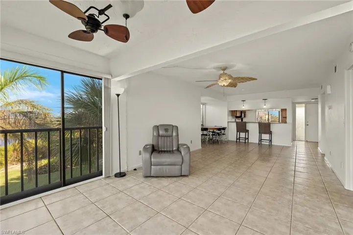 Unfurnished room with light tile patterned floors