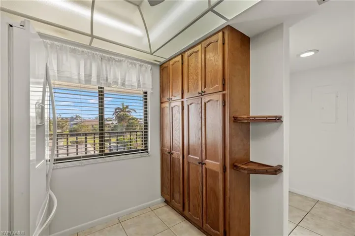 Kitchen featuring light tile patterned floors