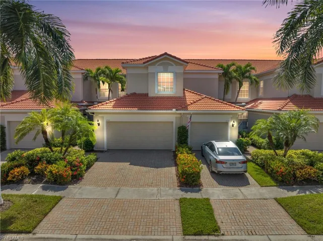 Mediterranean / spanish-style house featuring a garage