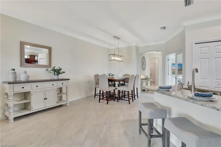 molding, and an inviting chandelier