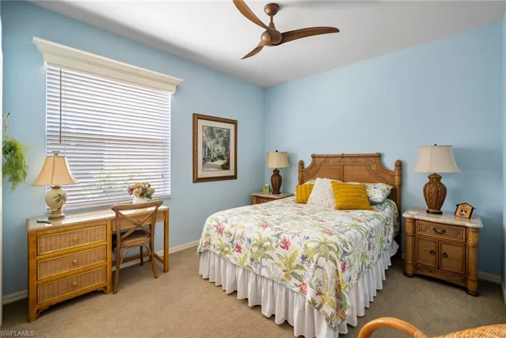 Bedroom with carpet flooring and ceiling fan