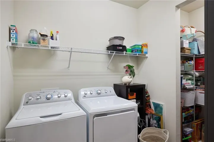 Laundry area featuring washer and clothes dryer