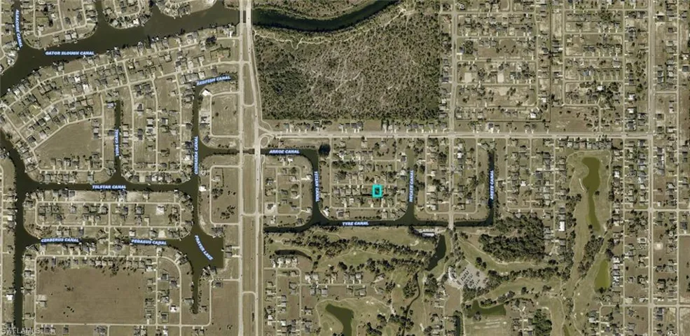 Aerial Property Map. Displaying the property's location within a canal network and surrounding infrastructure