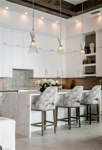 Living room with light tile patterned floors