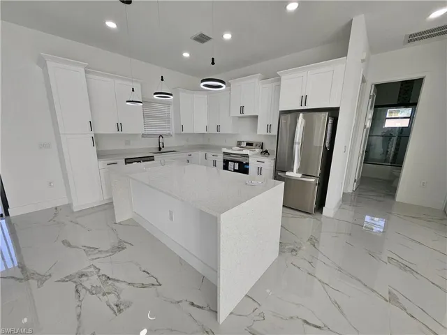 651  Keller E ST, Lehigh Acres, FL 33974