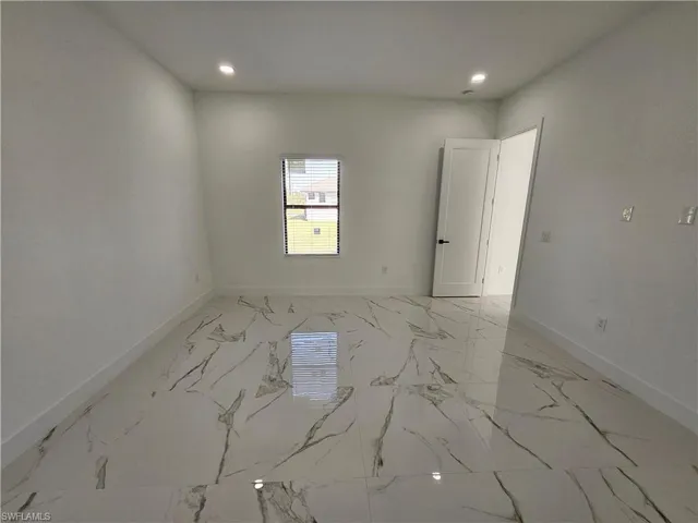 651  Keller E ST, Lehigh Acres, FL 33974