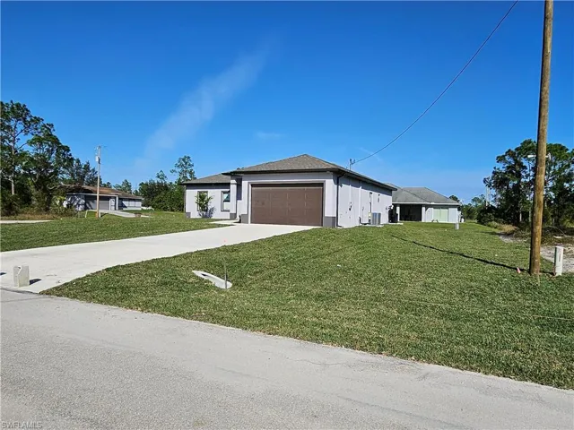 651  Keller E ST, Lehigh Acres, FL 33974