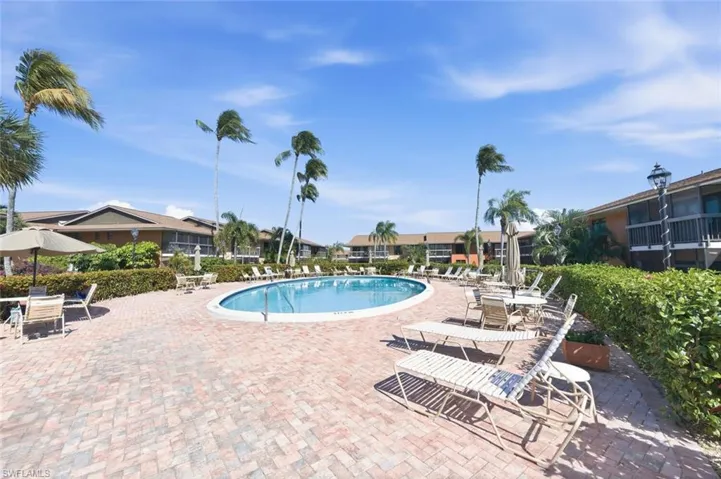 Community pool featuring a patio area