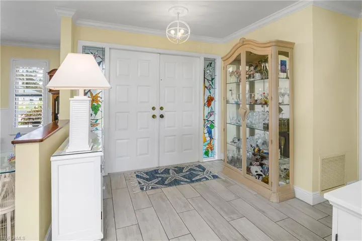 Wide Front entry with French doors