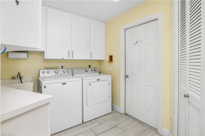 Large Laundry with Built in Cabinets