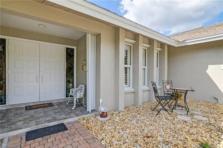 front door and garden seating