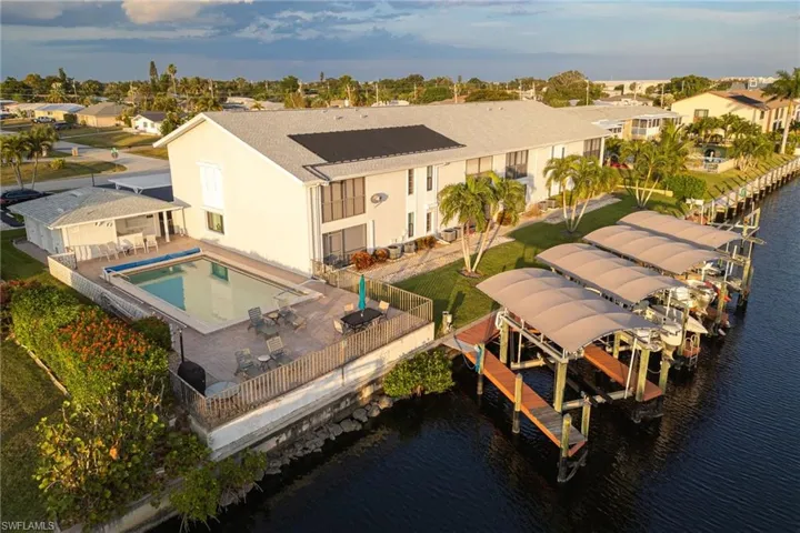 Aerial view of residential area with a large body of water