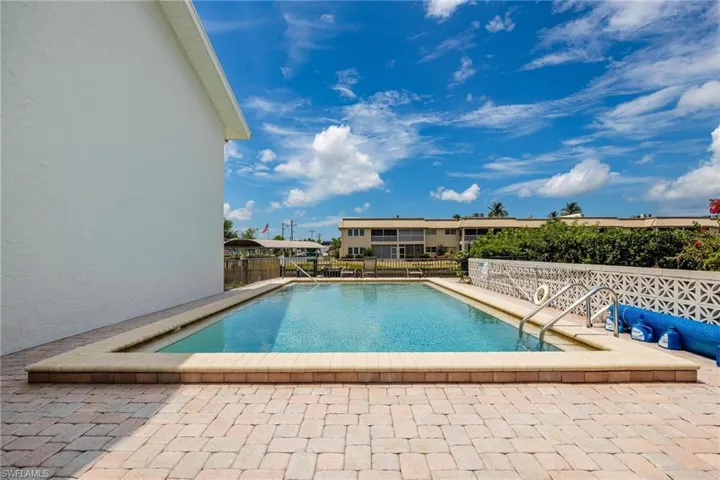 Community pool featuring a patio area