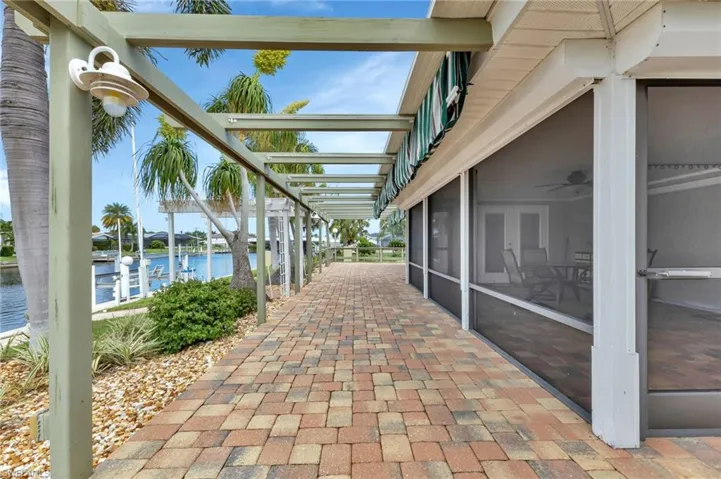 View of patio with a water view