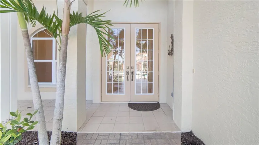 Front porch with electric hurricane shutters