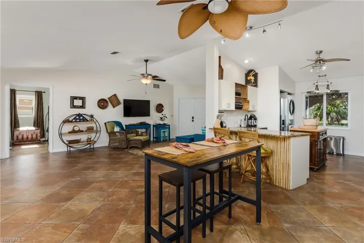 Dining room with lofted ceiling