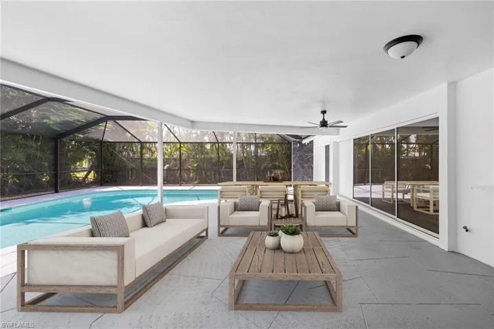 Outdoor pool featuring an outdoor hangout area, a patio, and a lanai