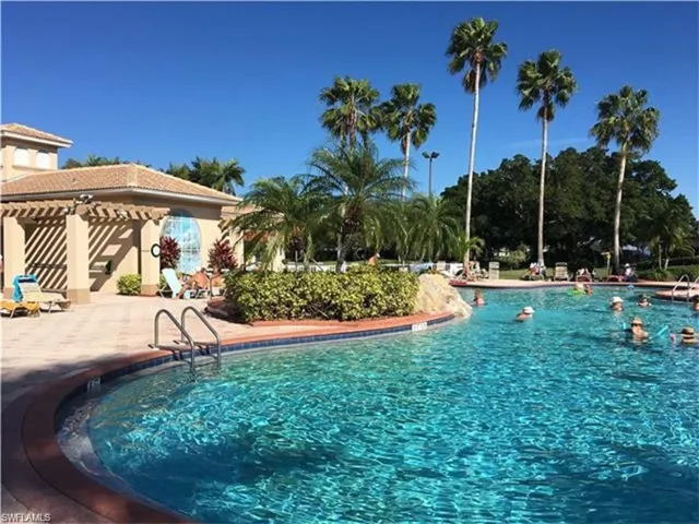 View of swimming pool featuring a patio and a gazebo
