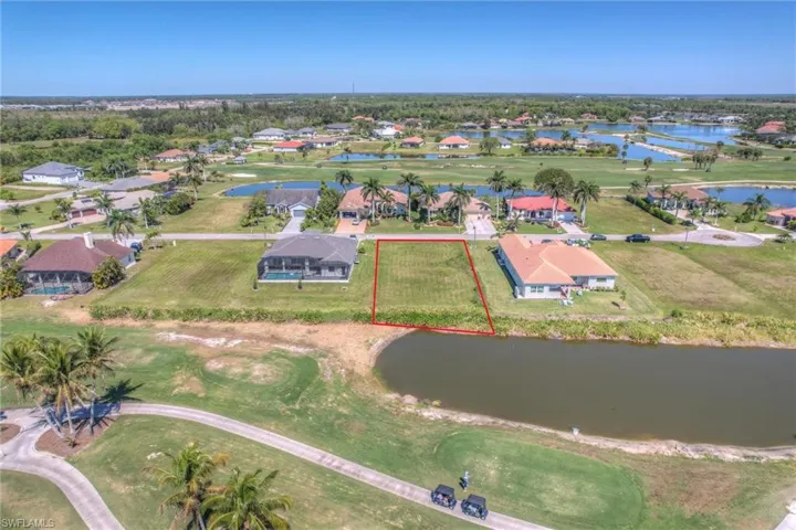 Aerial view featuring a residential view, a water view, and golf course view