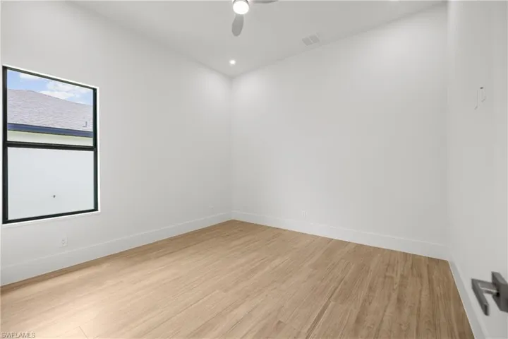 Spare room with recessed lighting, light wood-style flooring, and ceiling fan