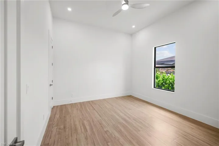 Spare room with light wood-style flooring, recessed lighting, and a ceiling fan