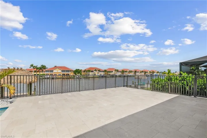View of patio with a water view and a residential view