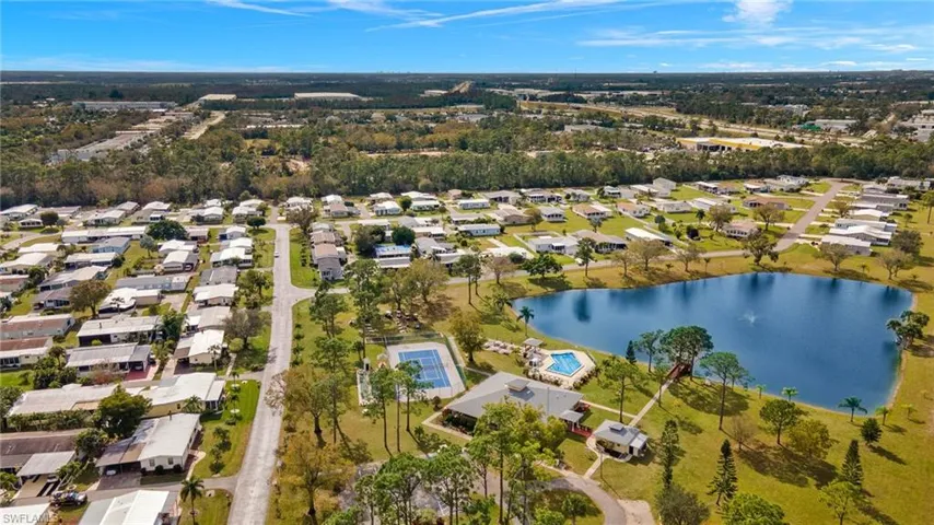 Drone / aerial view of the park with a water view