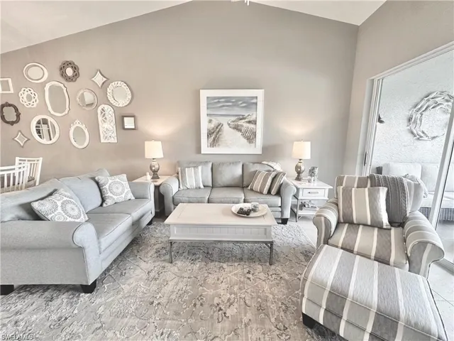 Living room with vaulted ceiling