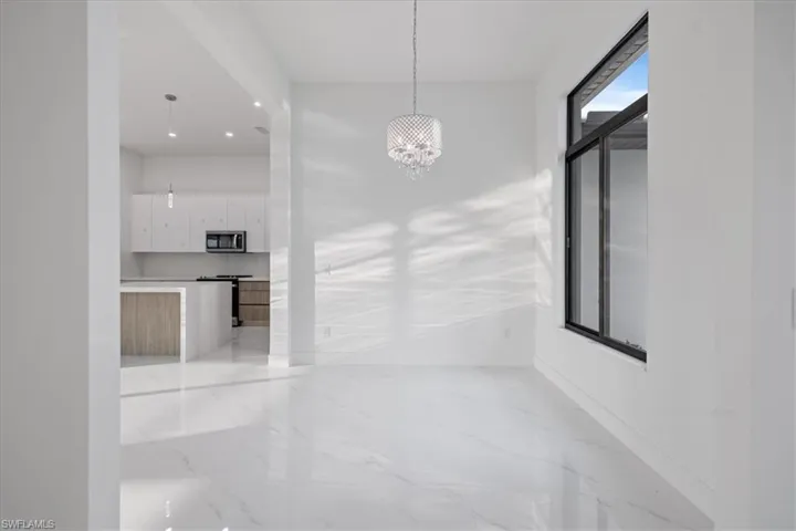 Corridor with a chandelier