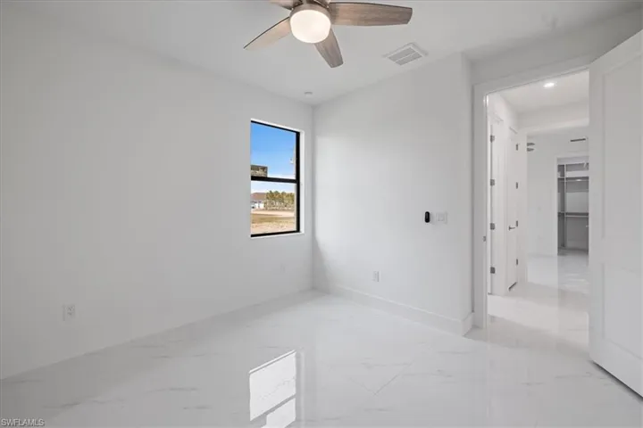 Unfurnished room with ceiling fan