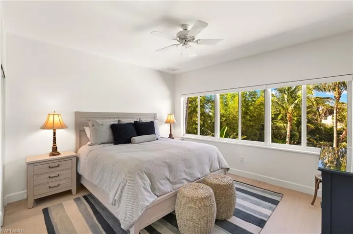 Bedroom featuring ceiling fan and light wood-style floors