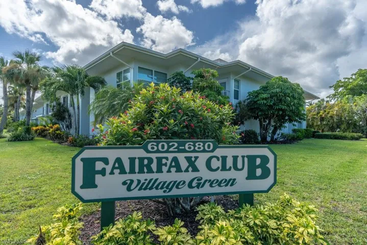Community sign with a lawn
