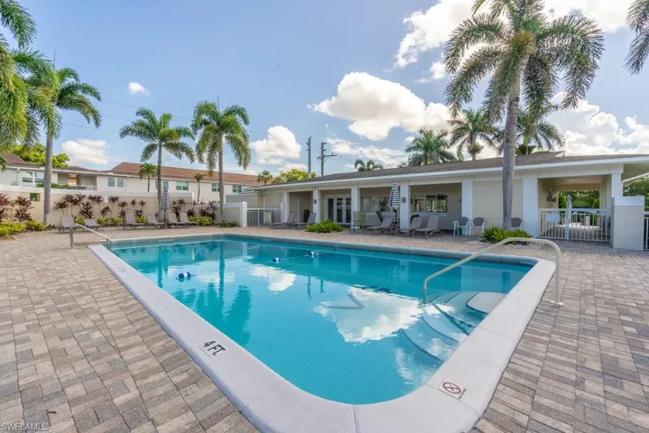 Community pool featuring a patio area