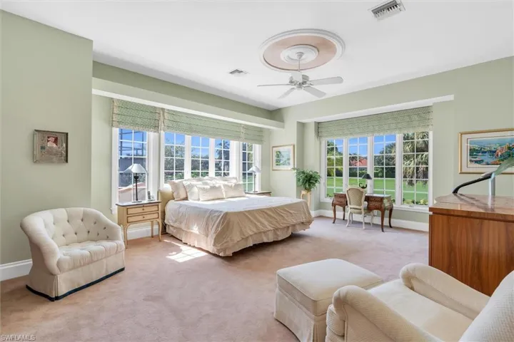 Primary Suite on Main Level with Golf Course and Water Views