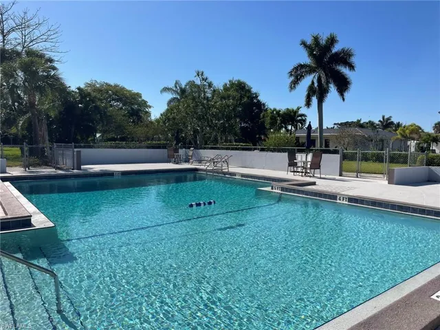 Community pool featuring a patio area
