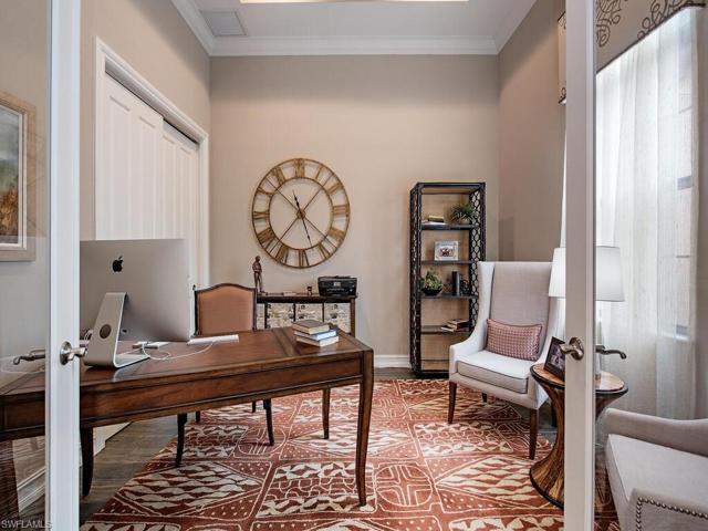 Den with closet and glass french doors