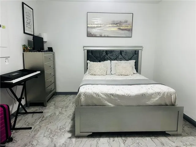 View of tiled bedroom