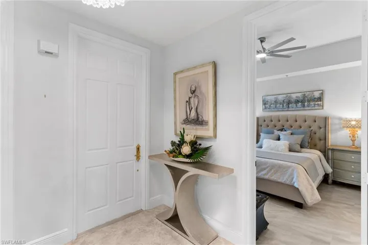 Bedroom featuring ceiling fan and baseboards