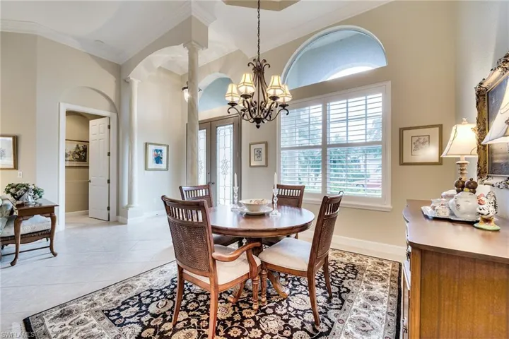 Formal dining area adjacent to living room