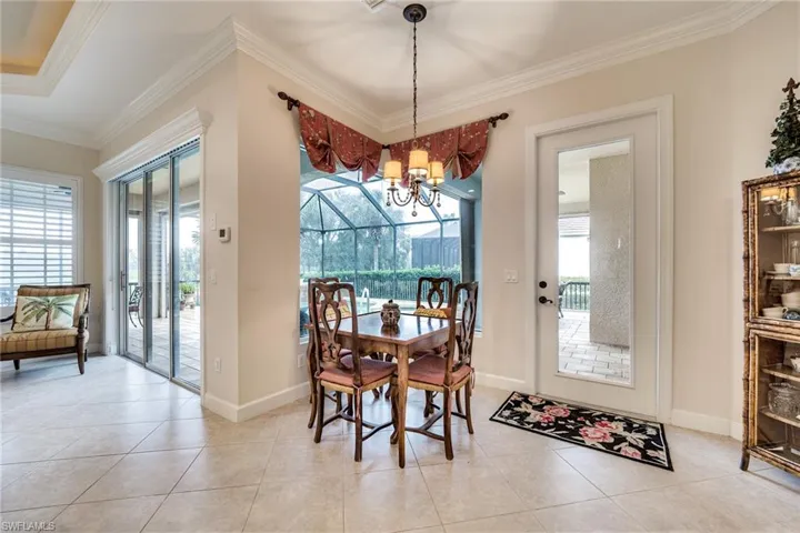 Mitered corner windw with a pool and golf view