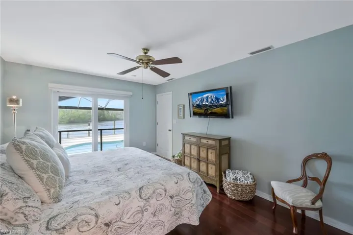 Yuor primary bedroom has access to the pool/lanai.