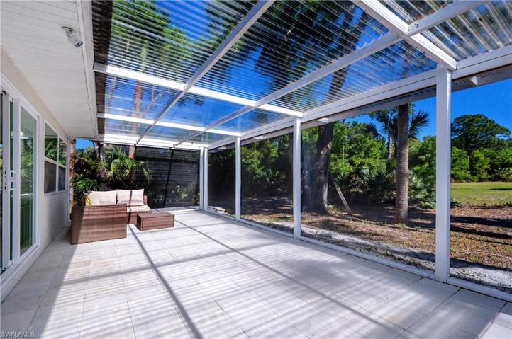 Outside patio overlooking backyard.