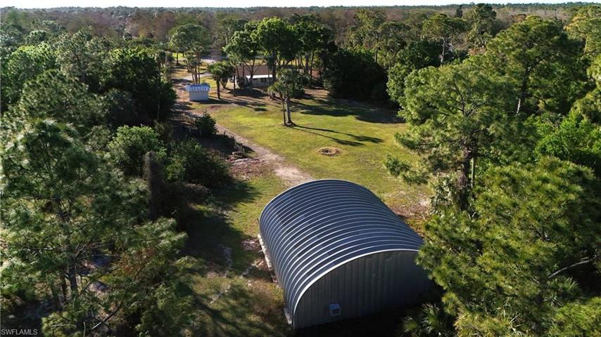 Rear view of workshop looking forward to 2.73 acre property.