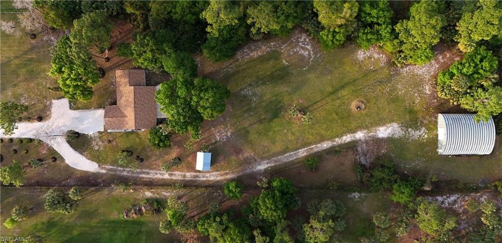 Aerial of 2.73 acre property, home, workshop and storage shed.